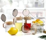 4-piece seasoning and oil set - a high-quality 4-piece glass set that includes two oil containers and two spice containers, airtight lids, ideal for cooking, preparing, and preserving flavors.