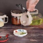 4-piece seasoning and oil set - a high-quality 4-piece glass set that includes two oil containers and two spice containers, airtight lids, ideal for cooking, preparing, and preserving flavors. - Image 3