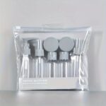 Travel Beauty - 6 Piece Trip Organizer Set Contains 1 Pump + 2 Bottles + 1 Long Pack + 2 Packs Creams and Airtight Bag.Multi-Use Painful Colors -(black &white)