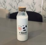 Generic Glass Milk Bottle with Cork Lid, 1200ml, Cute Cow Design, Hot and Cold Drinks .db - Image 2