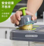 Jumbo Vegetable Slicer with Built-in Cutting Board, Multi-Blade Vegetable Cutter with Egg Yolk Separator, Vegetable Peeler and Brush to Clean the Slicer as Easy as a Pro - Image 4